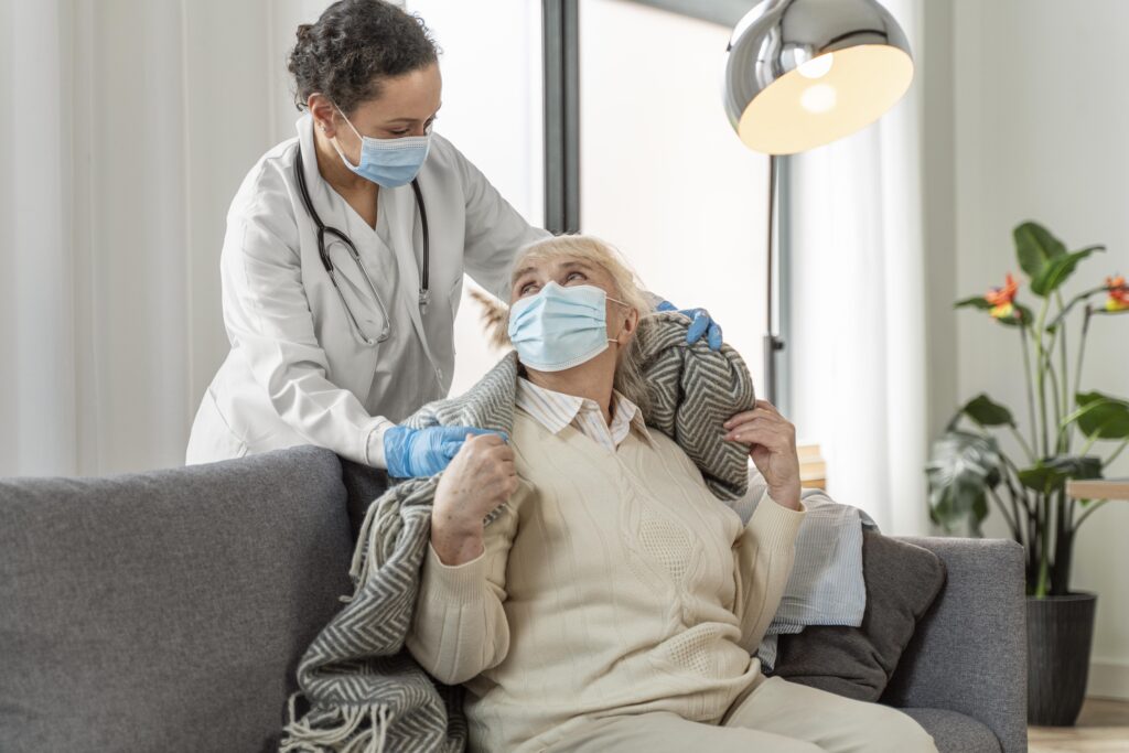 doctor taking care senior woman